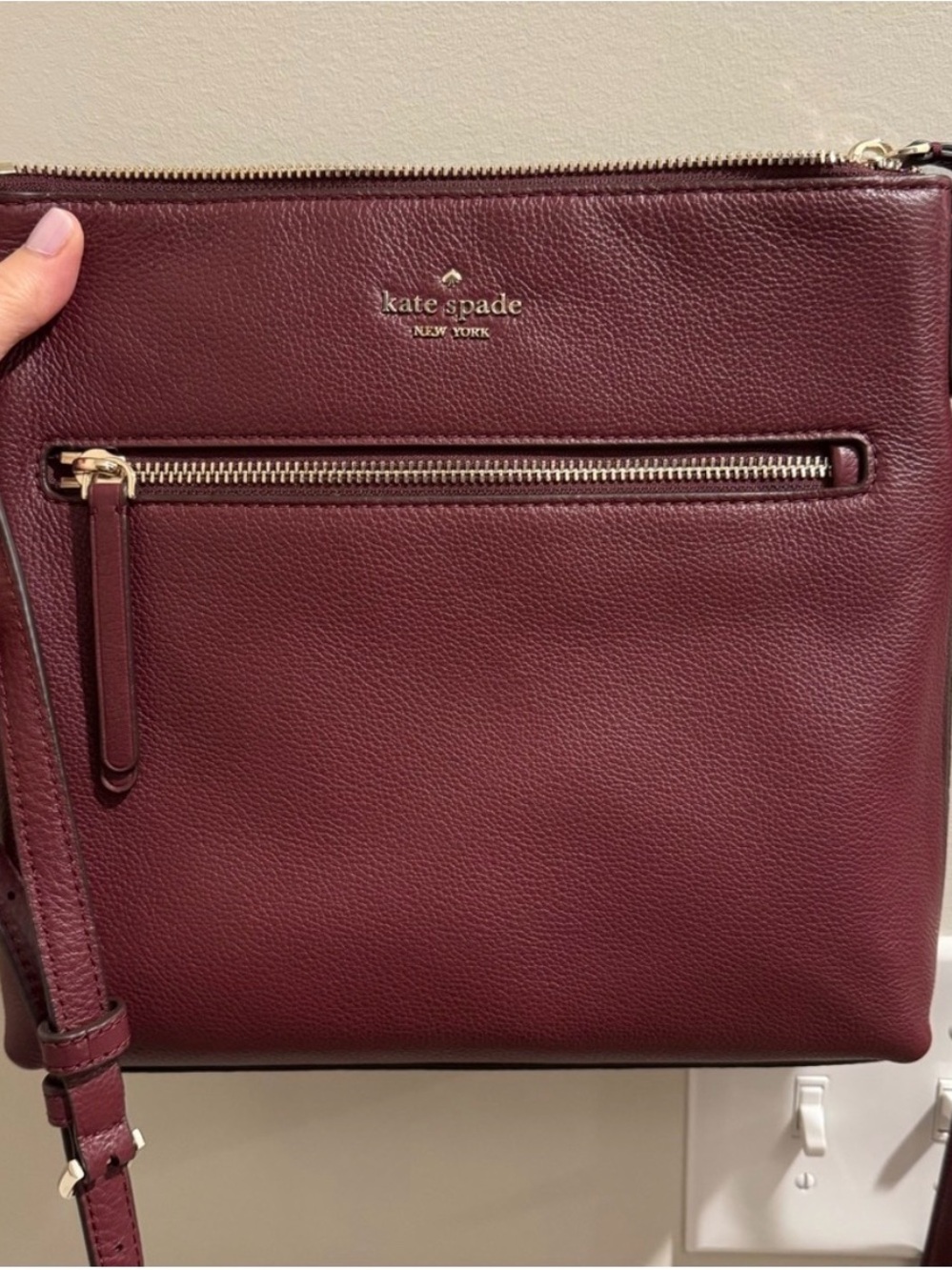 NWOT Kate Spade leather crossbody in deep burgundy with gold hardware